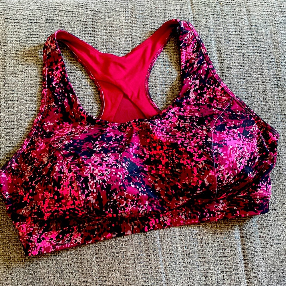 Pink and black sports bra.